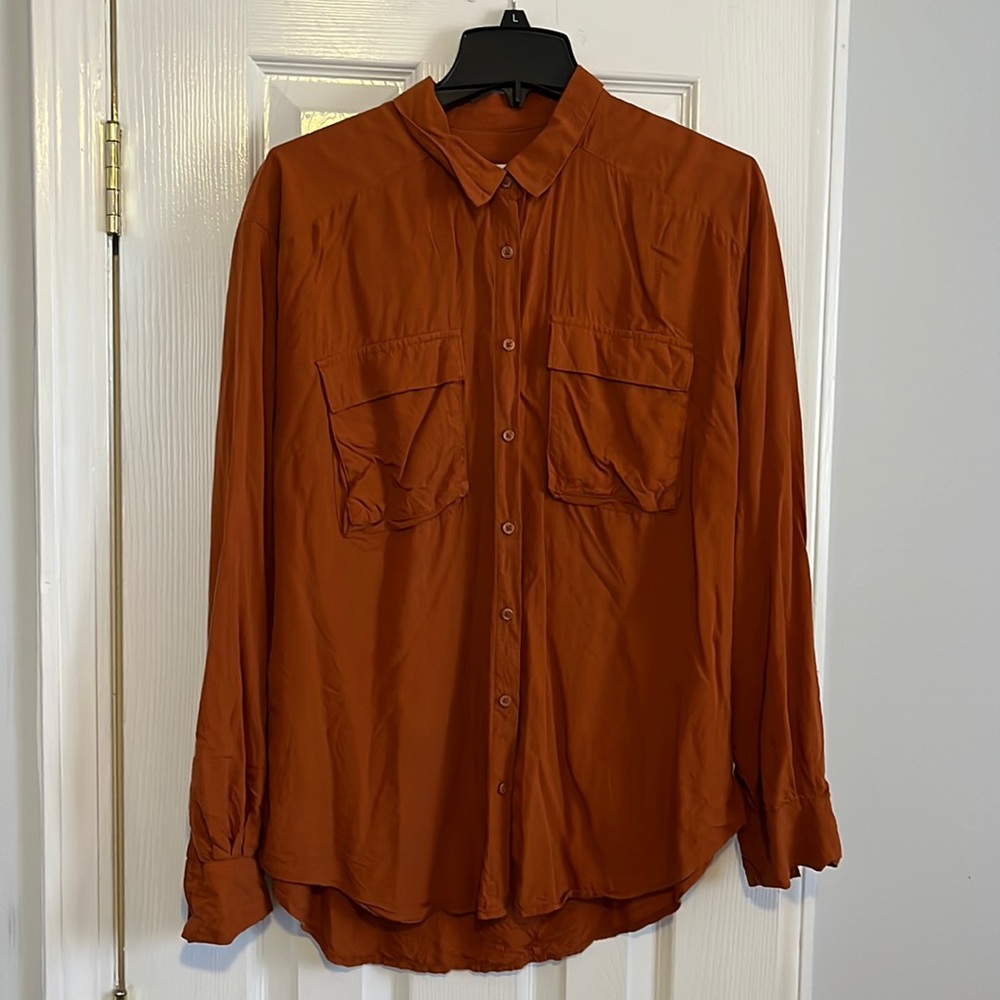 Women’s orange blouse